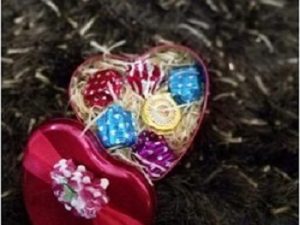 Red heart shaped tin box